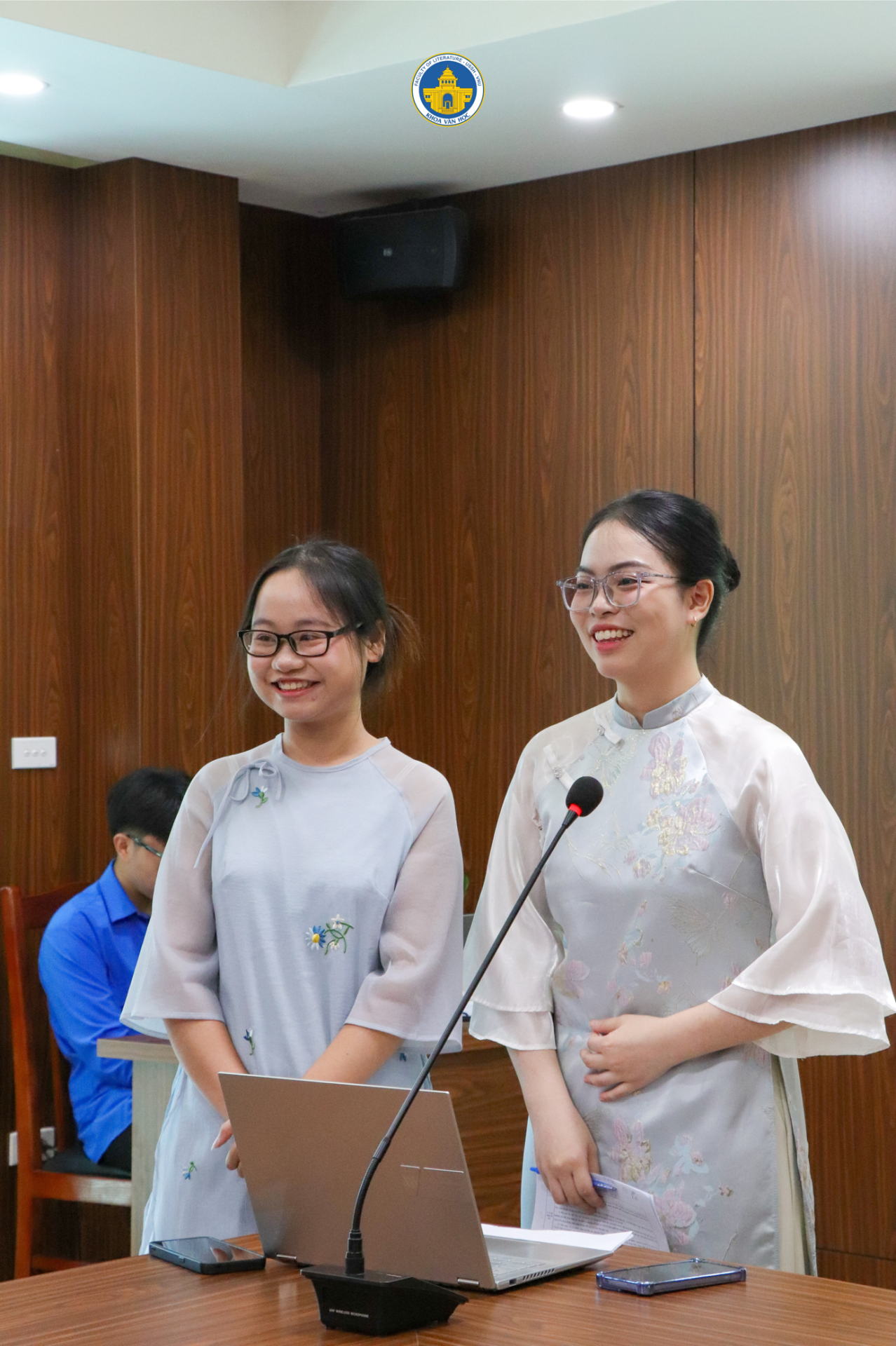 ''''''Two women standing in front of a microphone

AI-generated content may be incorrect.''''''